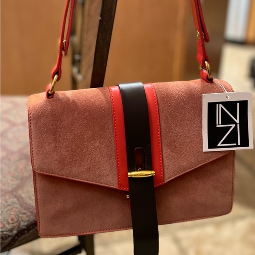 INZI orange Suede purse with leather and gold color accents
